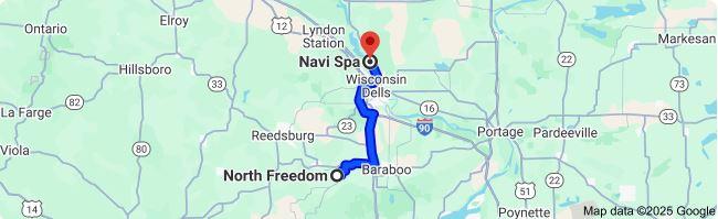Map showing 23-mile travel from North Freedom, Wisconsin to Navi Spa in Wisconsin Dells.